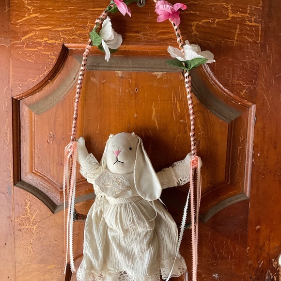 Easter door hanger-Bunny on a swing with flowers at the top12x29”.H97
